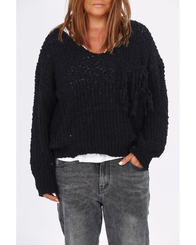 T-shirt ul alb este prezentat ca idee de asortat puloverul